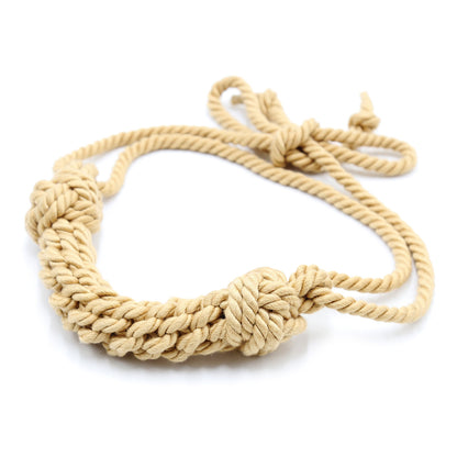 Side view of the rope woven BDSM ball gag made with handcrafted natural jute