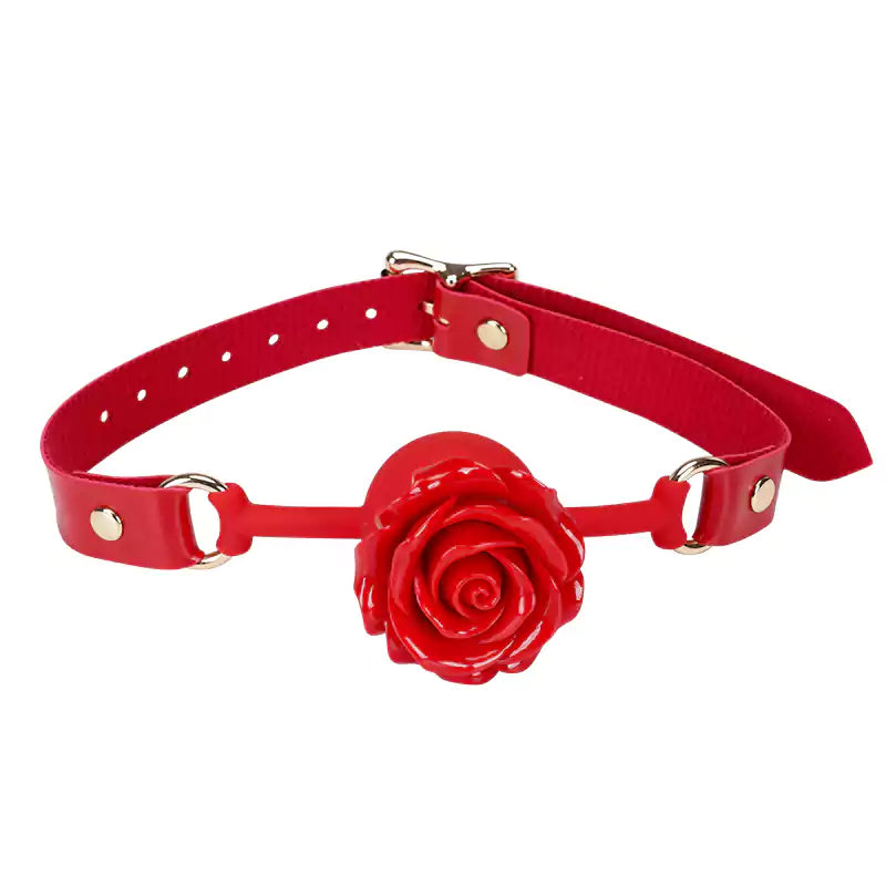 Red rose silicone ball gag with detachable sculpted silicone rose displayed on a clean white background