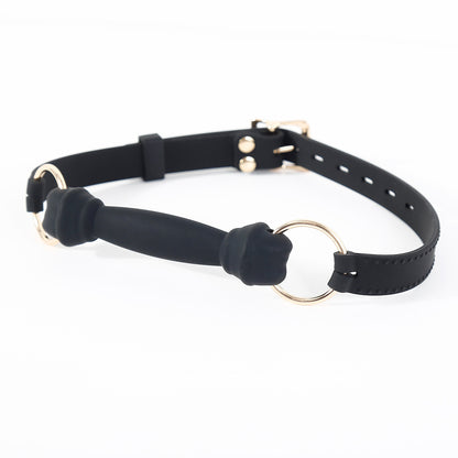 Side view of the black silicone bone bar gag with bone mouthpiece