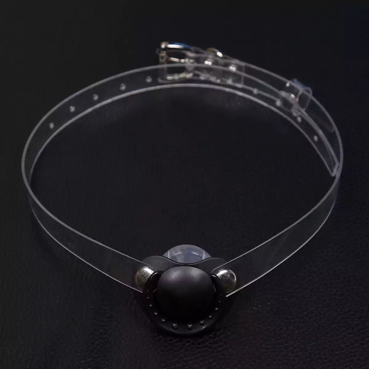 Black silicone pacifier restraint gag with transparent PVC strap