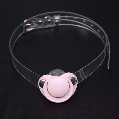 Pink silicone pacifier restraint gag with clear PVC strap