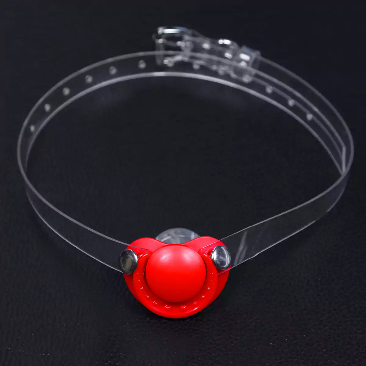 Red silicone pacifier restraint gag with transparent PVC strap
