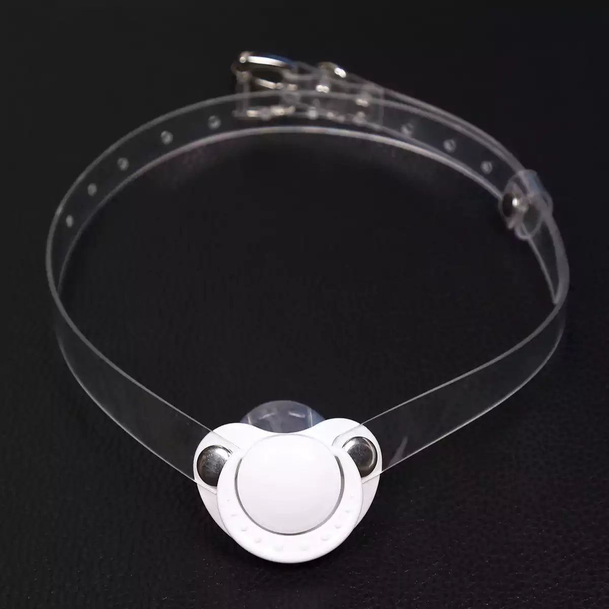 White silicone pacifier restraint gag with transparent PVC strap