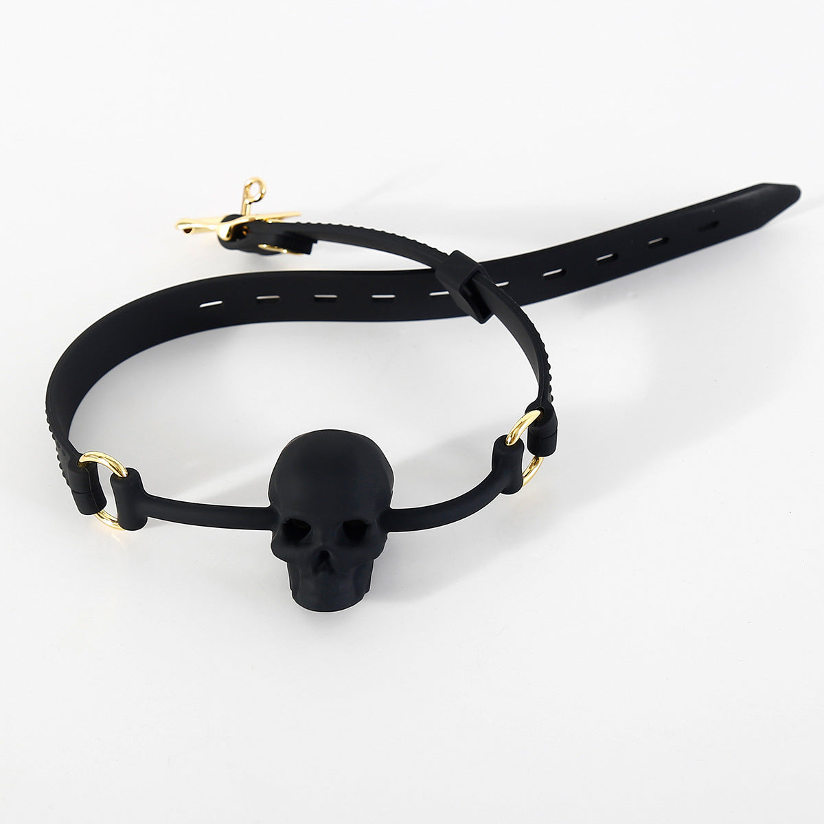 Black silicone BDSM ball gag with vented skull mouthpiece displayed on a clean white background