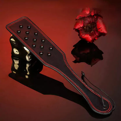 Dual-color snake pattern hand spanker paddle back side view
