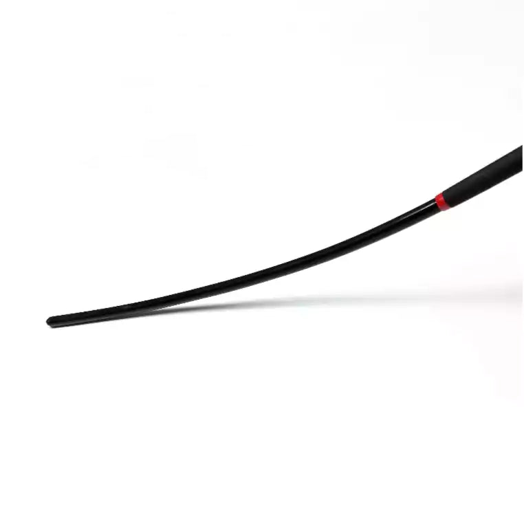 Close-up detail of black soft acrylic flexible discipline cane surface