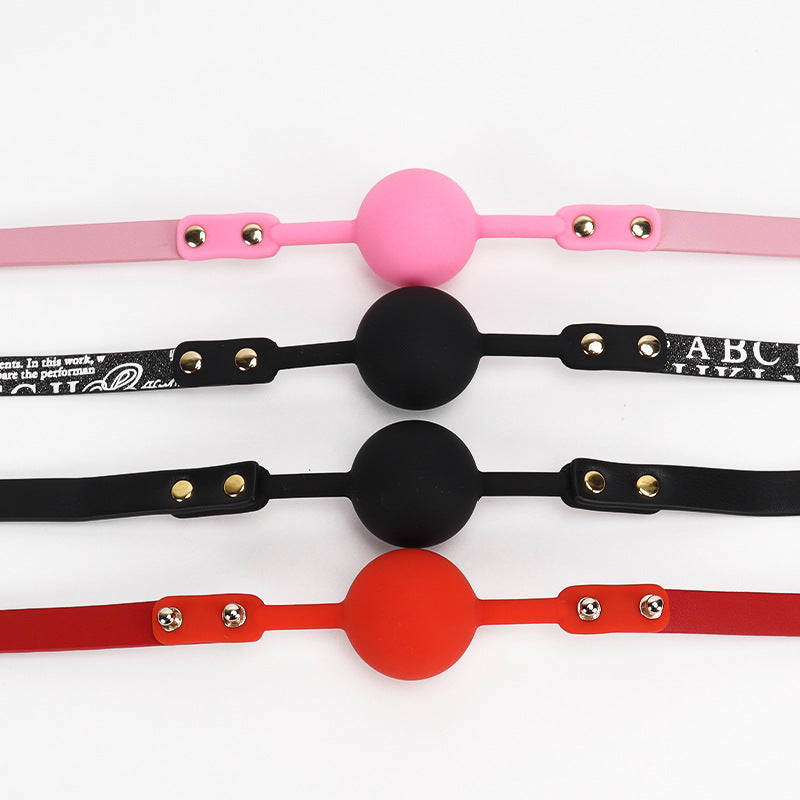 Close-up group detail of the soft silicone ball gag with 1.57-inch ball showing multiple color options