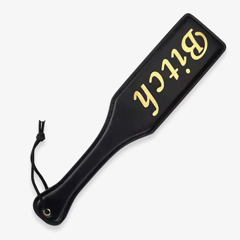 Pala para nalgadas "Black Gold-Letter" — Cuero de PU, Diseño con letras doradas
