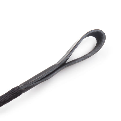 Side close-up of the stitched striking tip on the riding crop with braided black handle