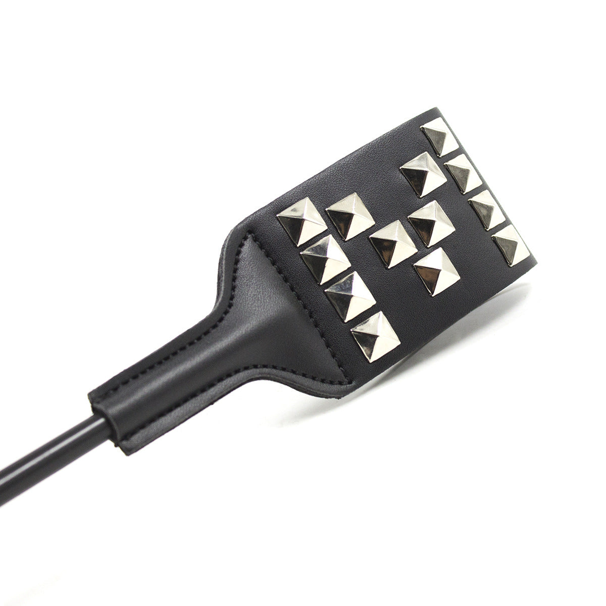 Close-up of metal stud pattern on faux leather striking face