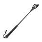 Studded riding crop with rubber handle full view showing faux leather face