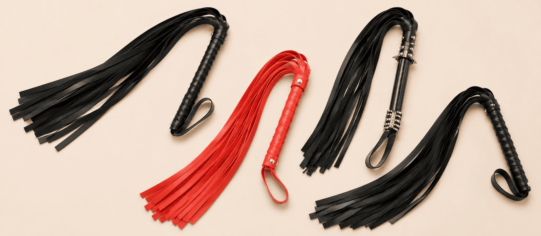 Thuddy floggers with deep impact feel, soft tails, and controlled handling.