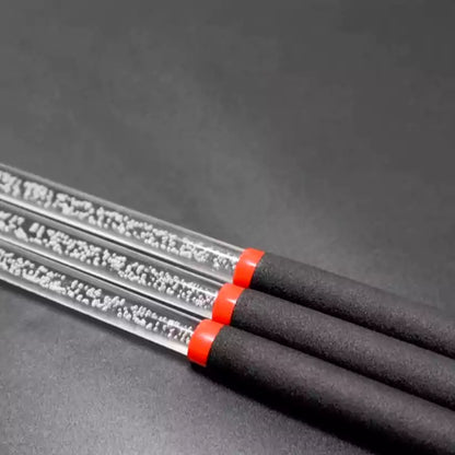 Close-up of non-slip handle on transparent acrylic discipline cane