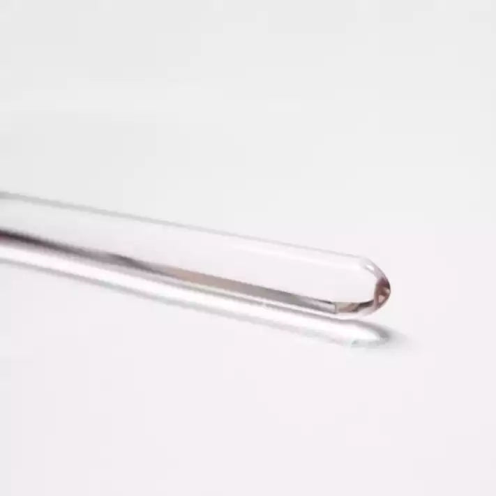 Close-up of rounded tip on clear acrylic discipline cane
