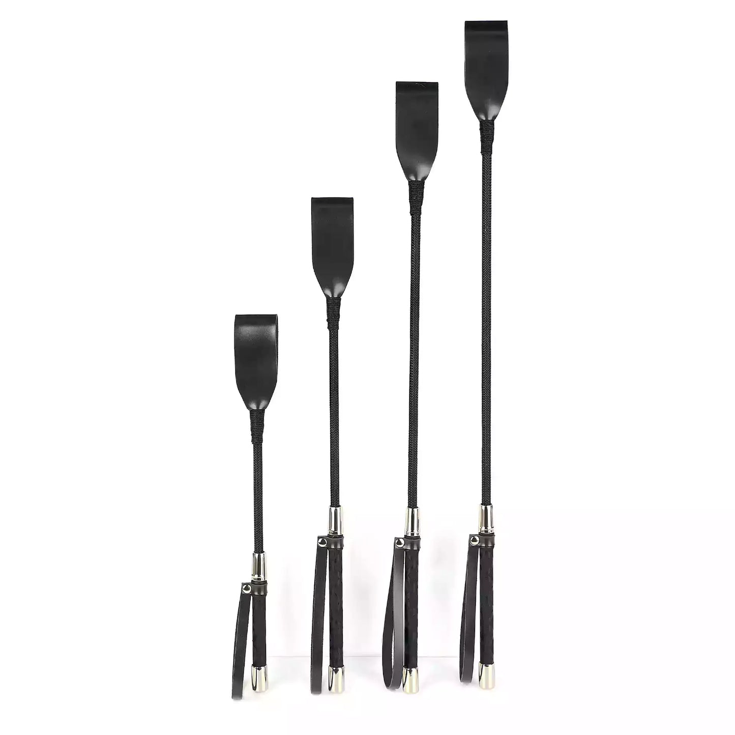 Vintage black riding crop in all four lengths together comparison