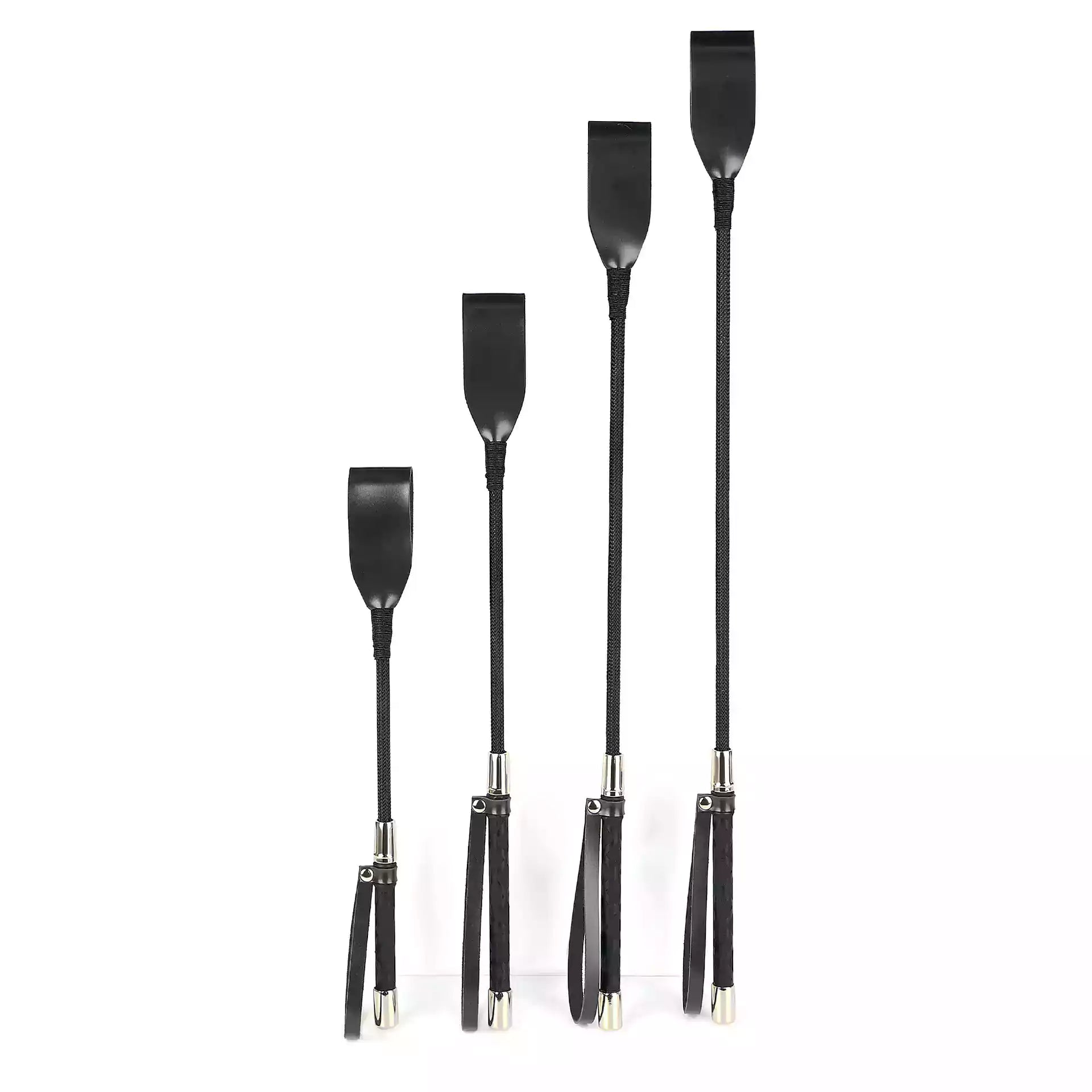 Vintage black riding crop in all four lengths together comparison