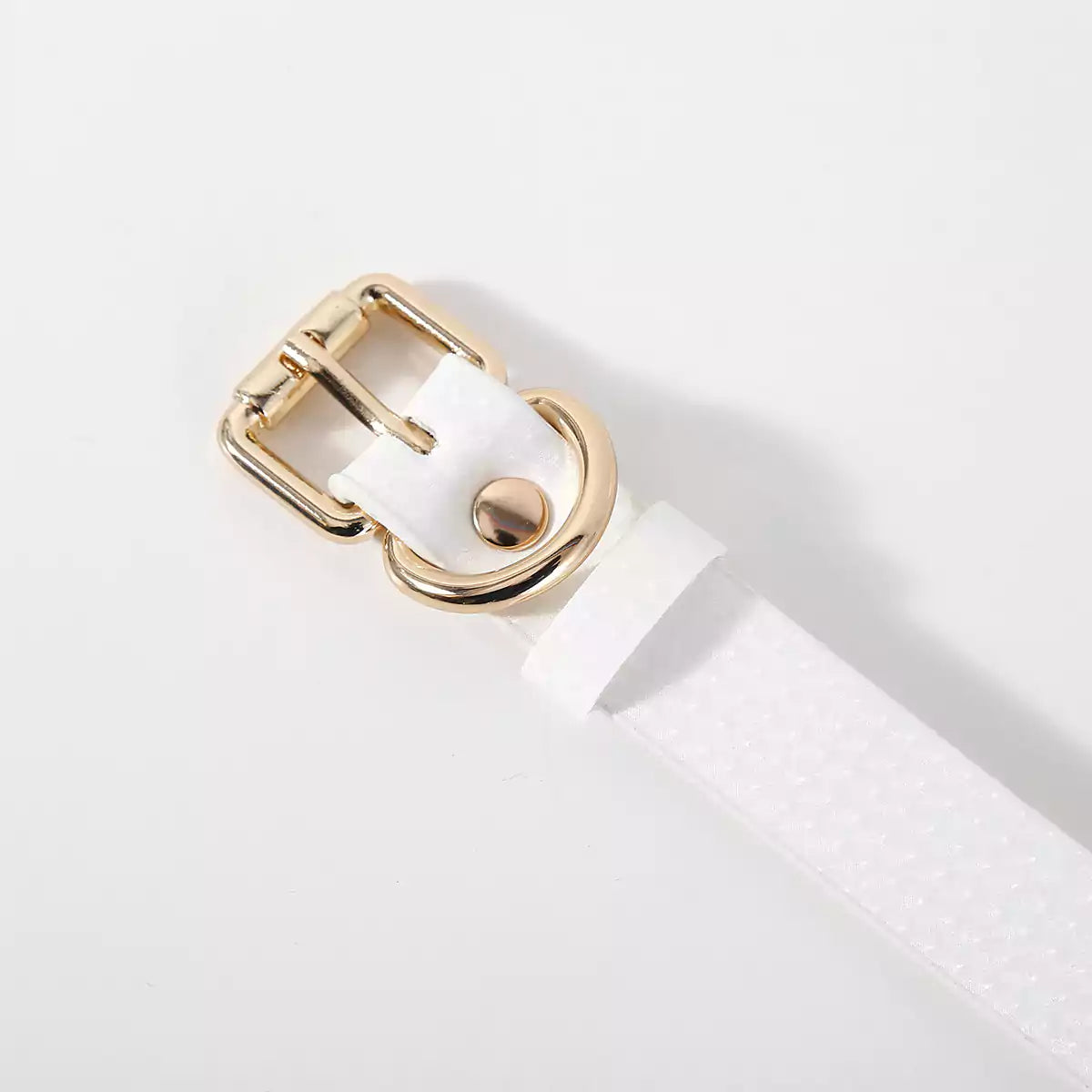 Detailed view of the white breathable ball gag construction