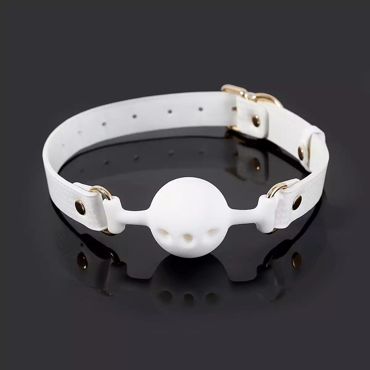 White breathable ball gag featured in an atmospheric product scene