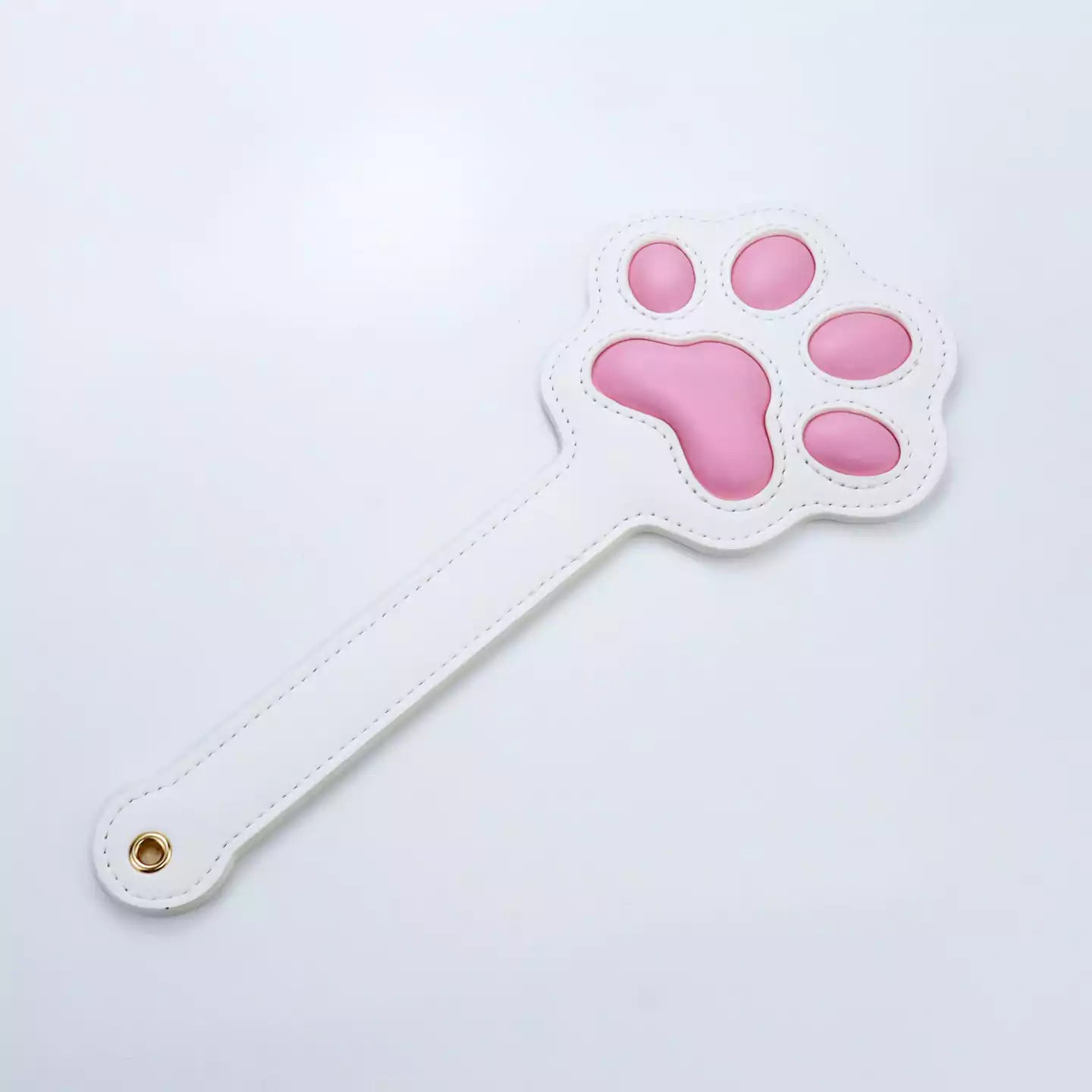 White silicone cat paw paddle angled perspective view