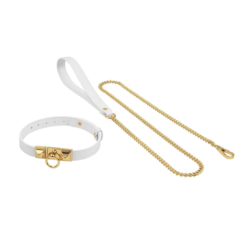 White crocodile-pattern collar and matching leash with gold-tone hardware on a white background