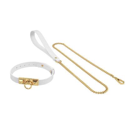 White crocodile-pattern collar and matching leash with gold-tone hardware on a white background