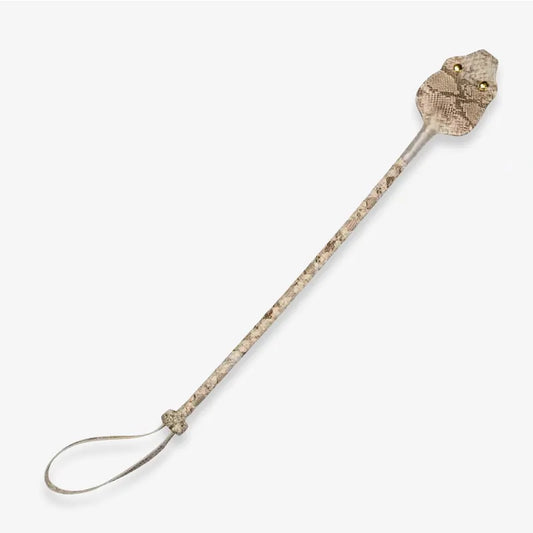 White-gold snakeskin leather riding crop full view showing hand-woven construction