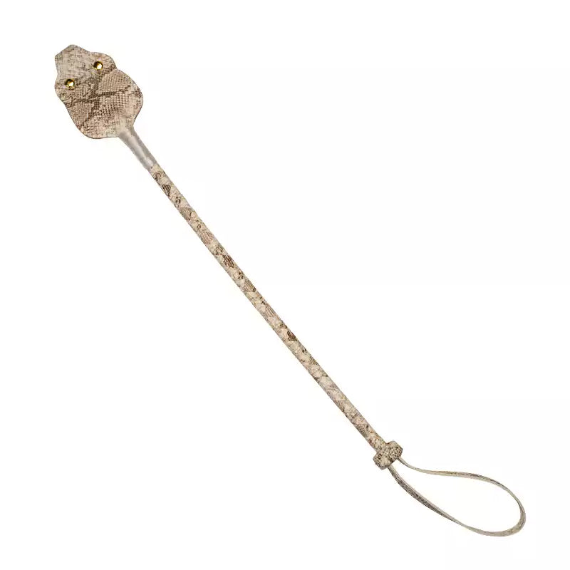 White-gold snakeskin leather riding crop on white background