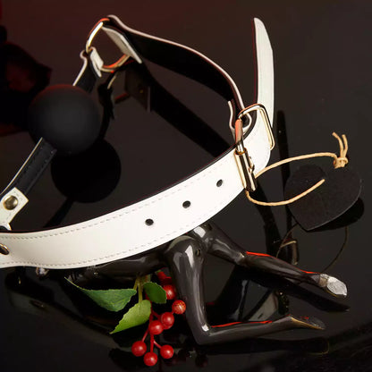 Detailed view of the handcrafted white genuine leather strap on the ball gag
