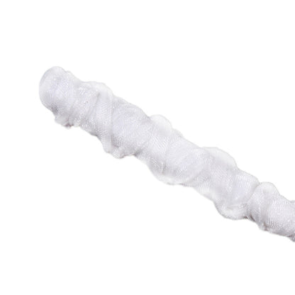 Close-up of ribbon-wrapped handle on white studded BDSM riding crop