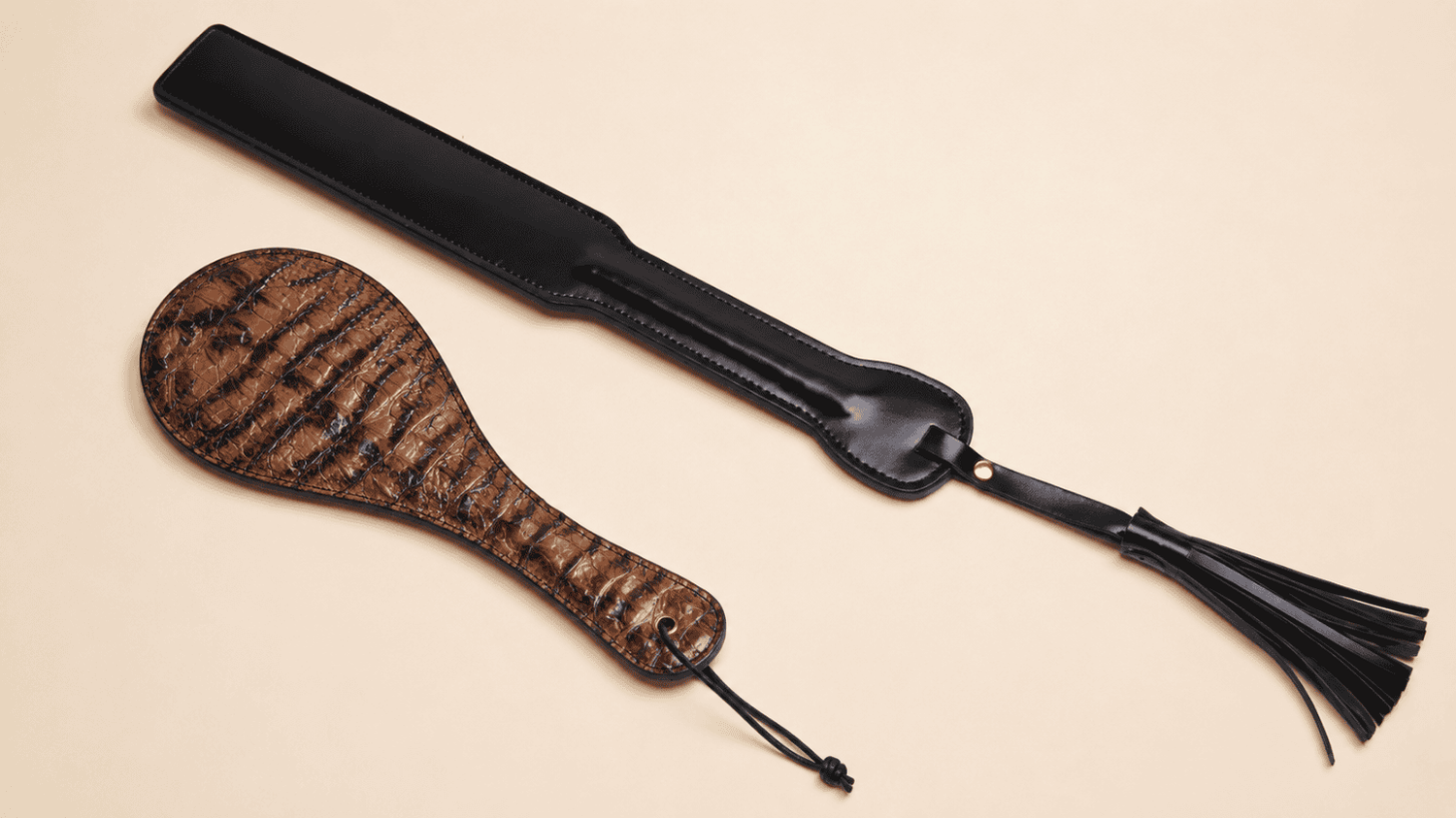Leather spanking paddle with durable layers, smooth finish, and flexible feel.