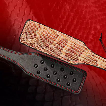 Yellow snake pattern hand spanker paddle front and back detail view